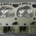 A finished cylinder head; light port and polish with resurfacing.